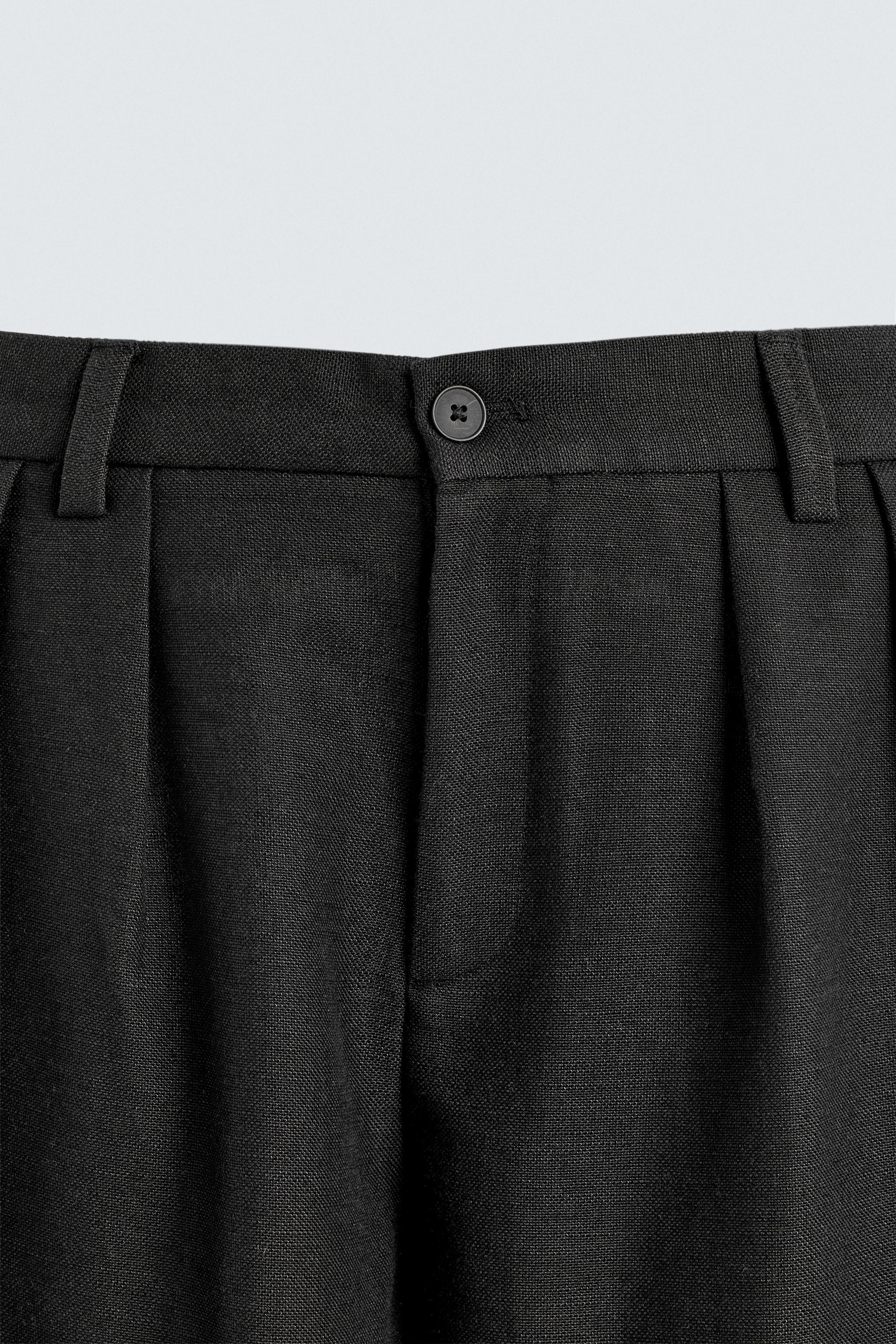 PLEATED RELAXED FIT PANTS